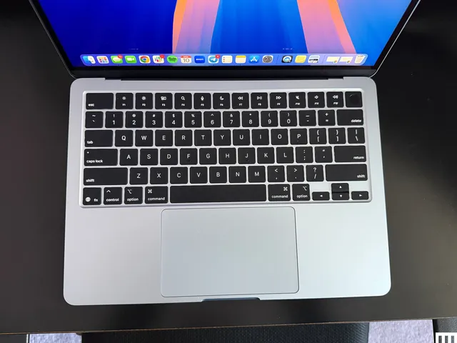 Overhead view of an Apple MacBook Air 13-inch 2025 laptop, showing a closeup of the keyboard