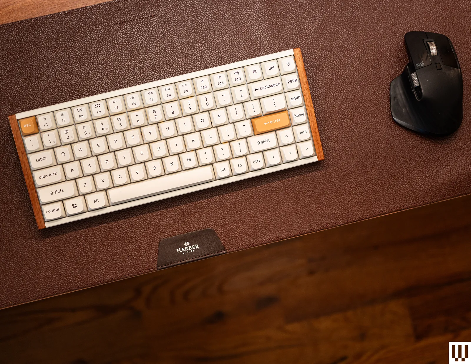 Harber London Professional Leather Desk Mat a brown leathertextured mat with a computer keyboard and black computer...